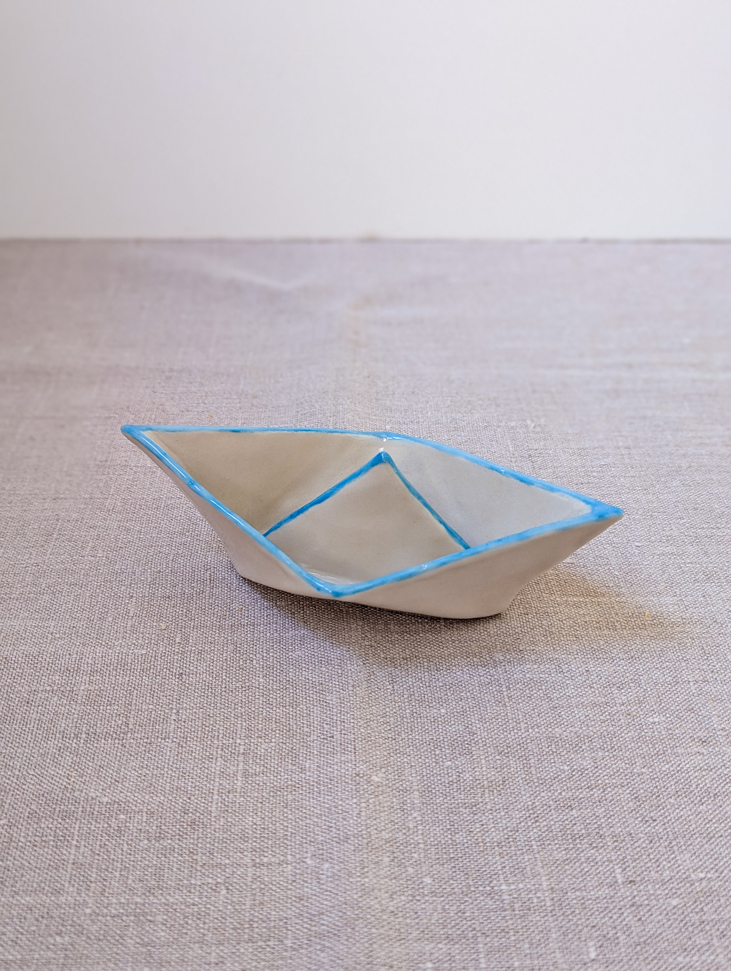 Ceramic paper boat