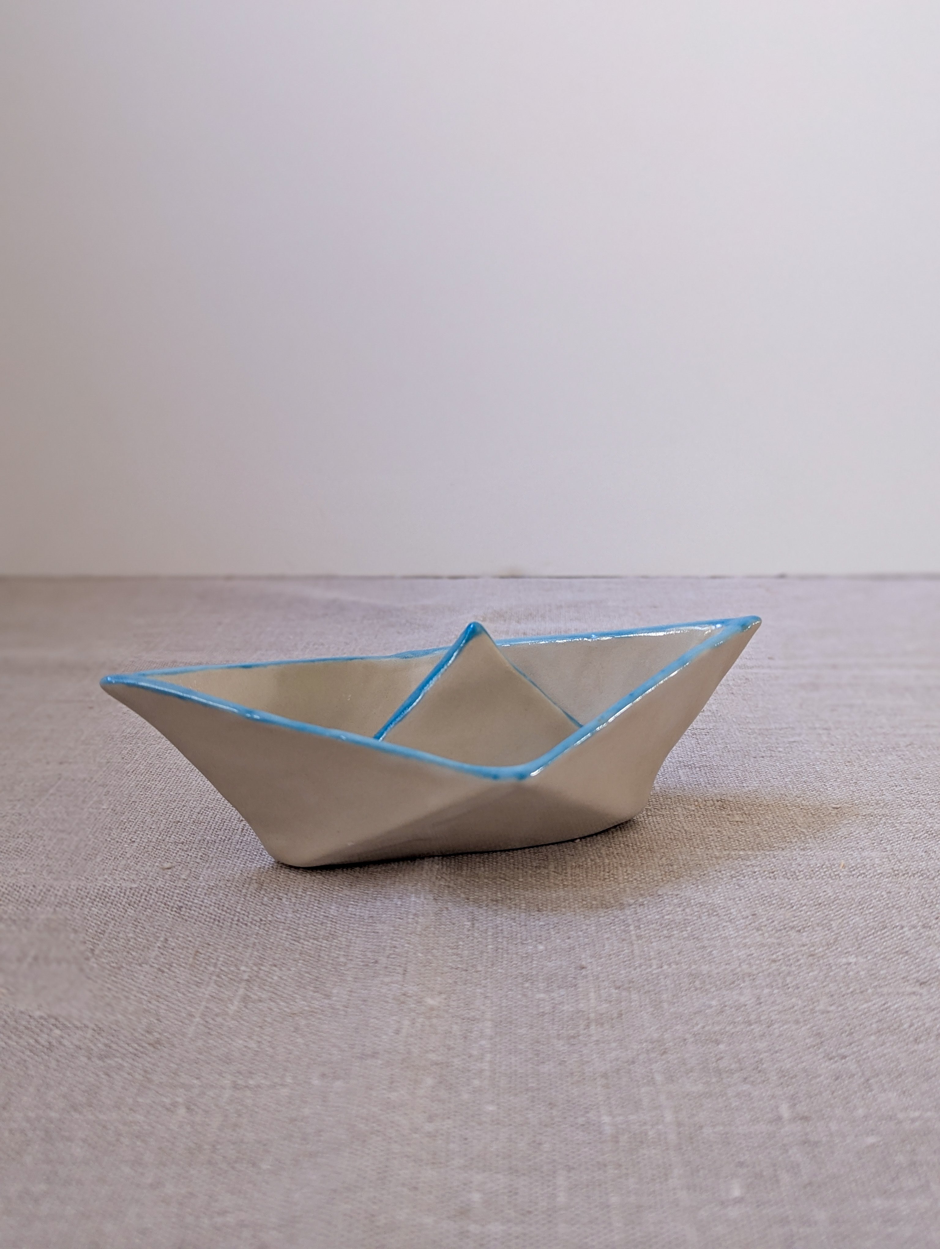 Ceramic paper boat